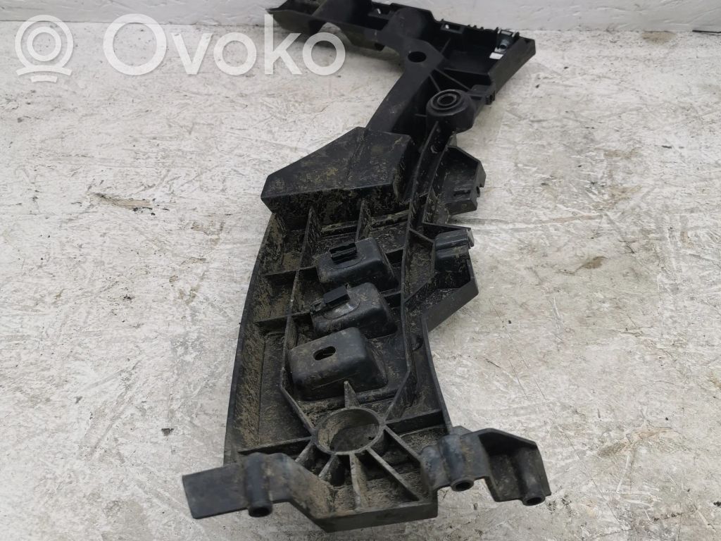 Opel Astra L Soporte de montaje del parachoques trasero 