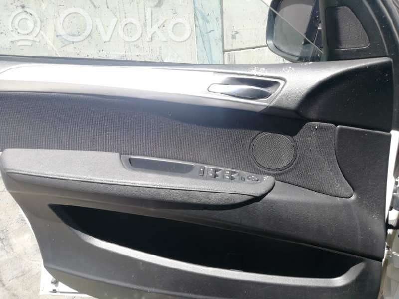 Front door card panel trim