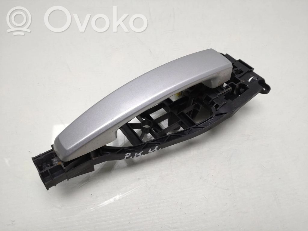 Opel Zafira B Front door exterior handle 