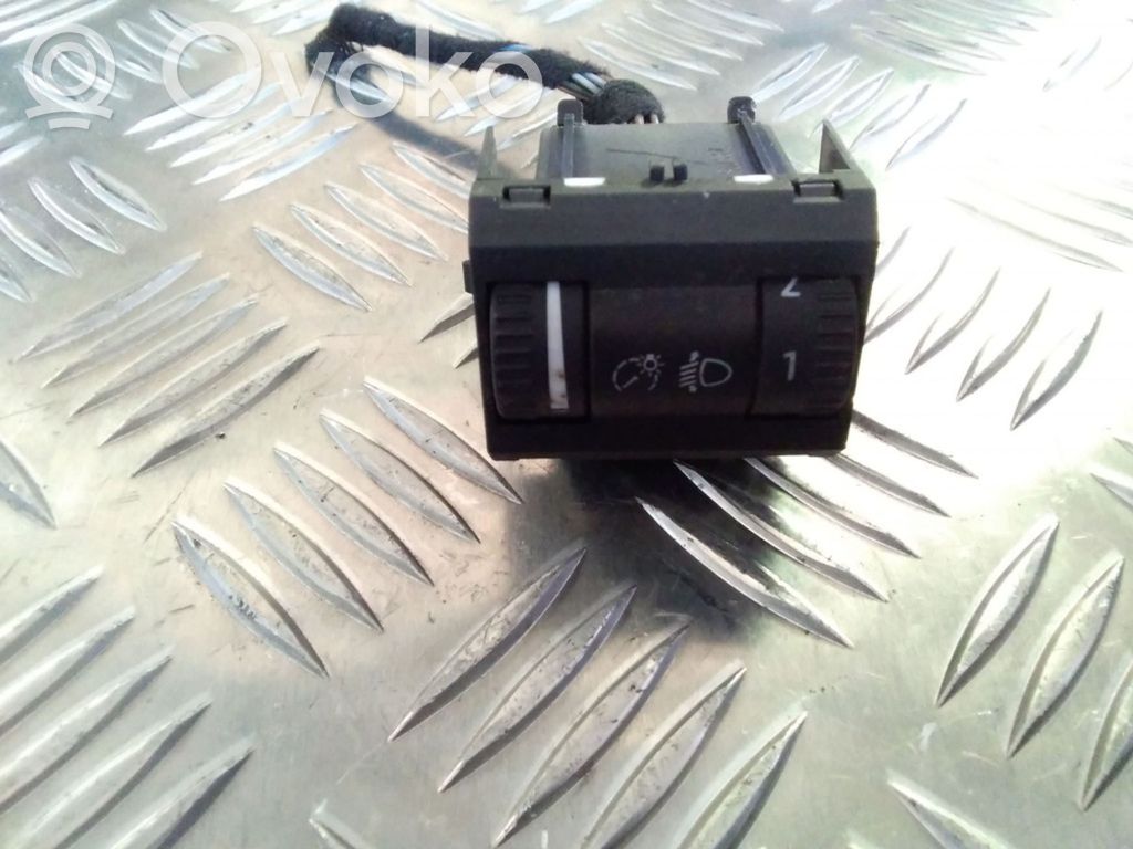 Headlight level height control switch