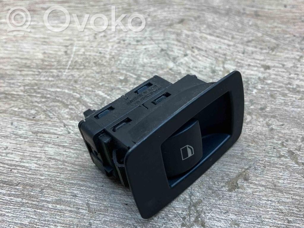 Electric window control switch   6935534,6945874