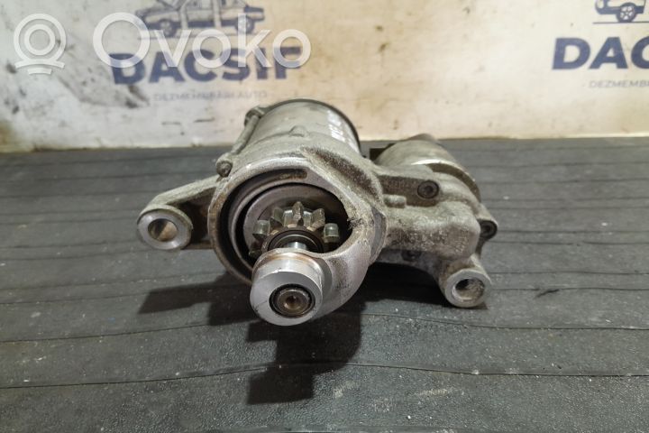 Starter motor   06L911021