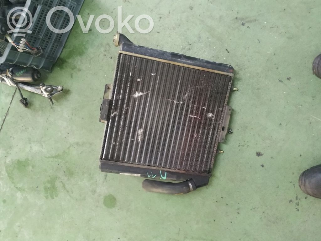 Other engine part   302121,RADIADORAGUA