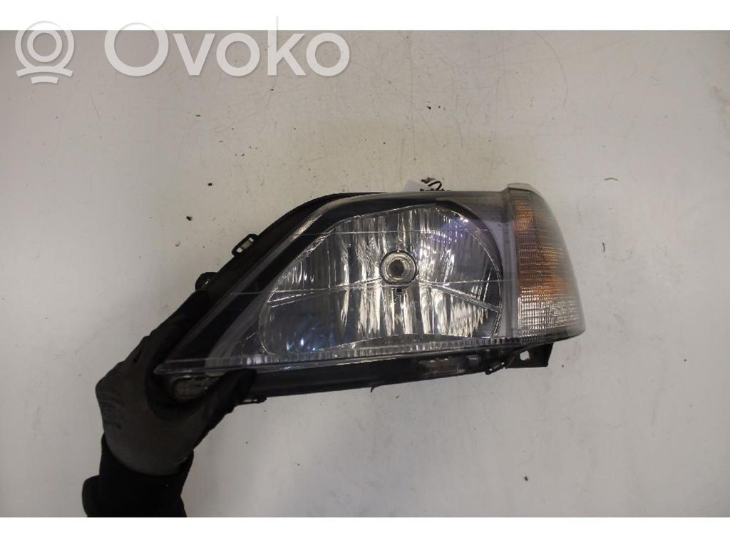 Dacia Logan I Lampa przednia 