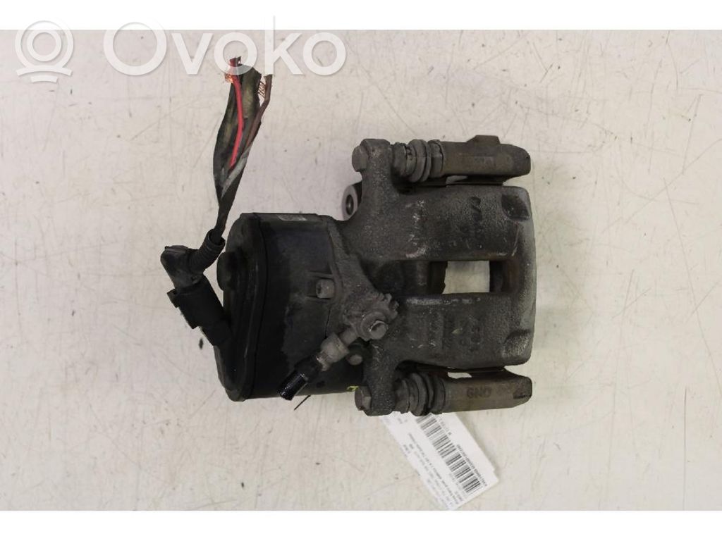 Volkswagen PASSAT B7 Rear brake caliper 