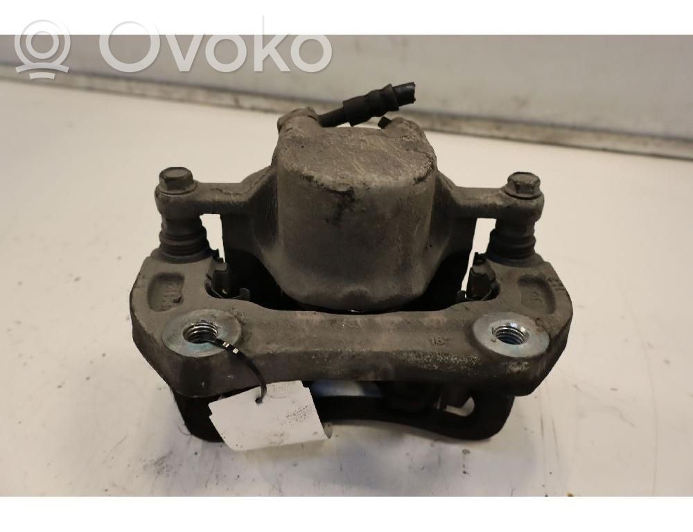Opel Insignia A Zacisk hamulcowy przedni 