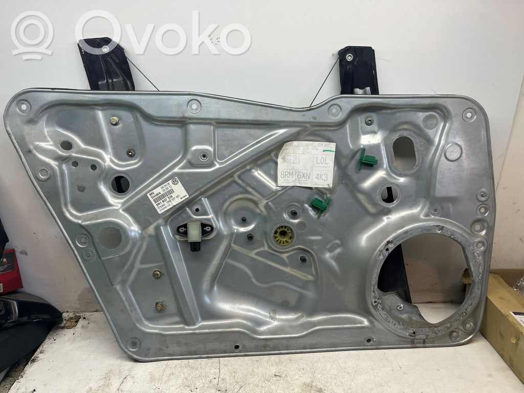 Volkswagen Tiguan Elektryczny podnośnik szyby drzwi przednich 