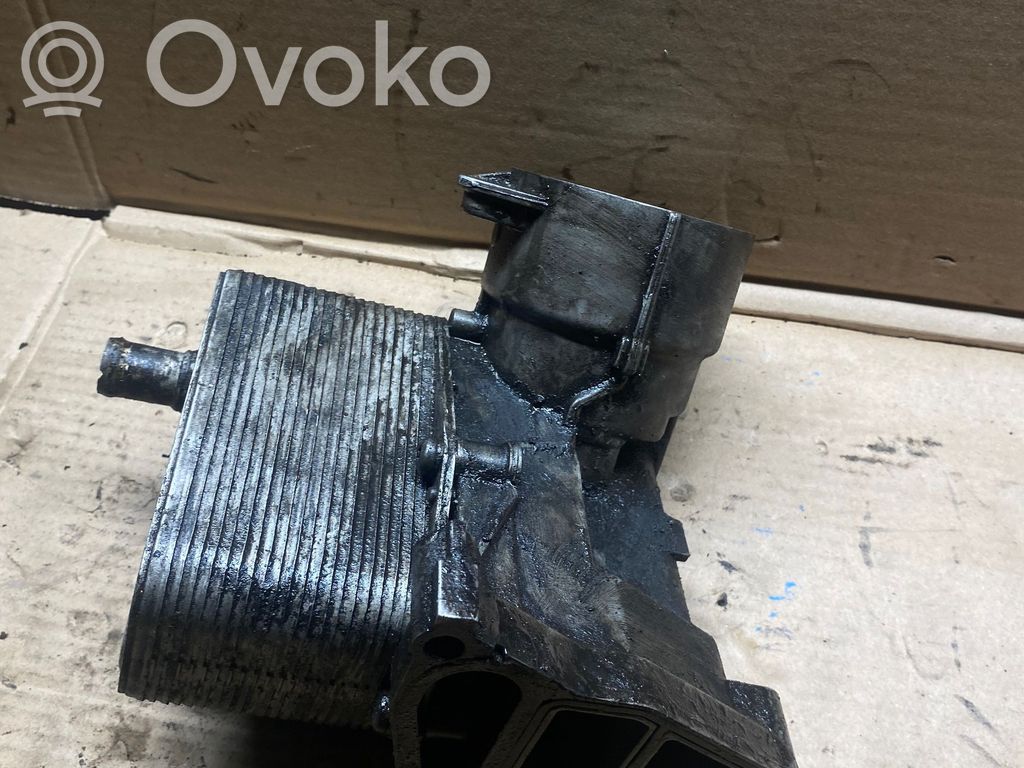 Oil filter mounting bracket   2247204,8792145