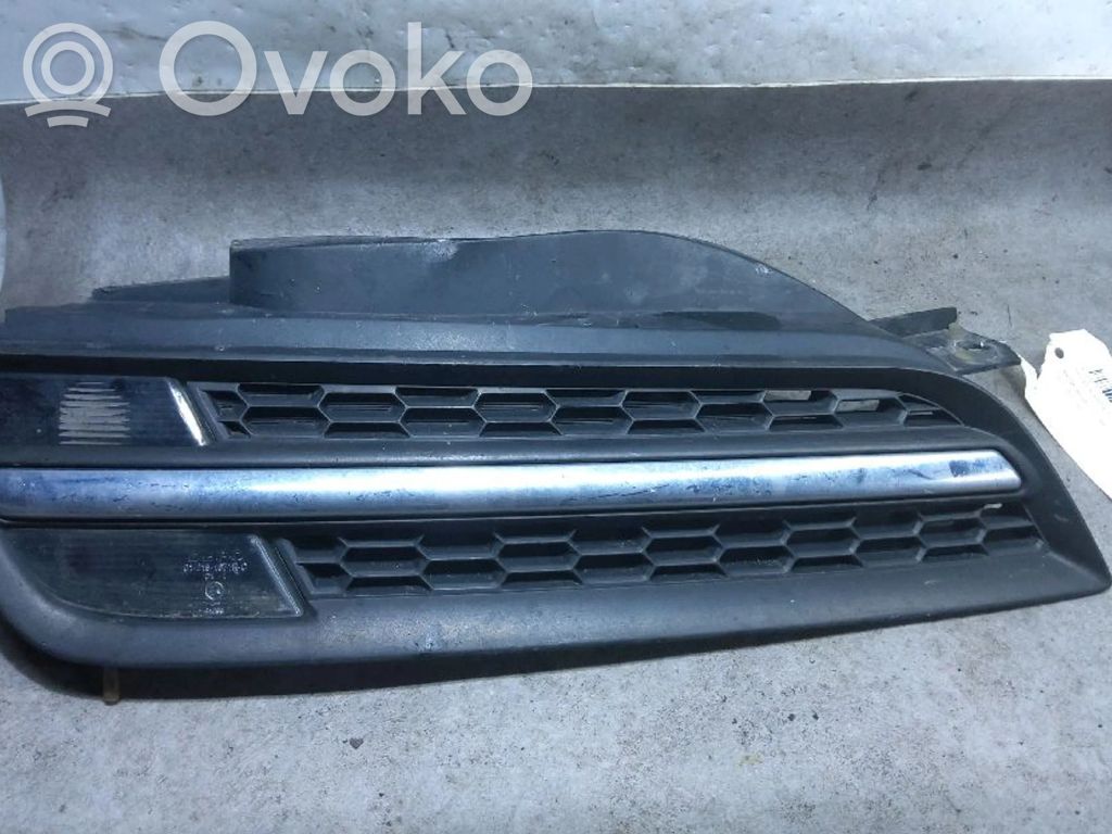 Nissan Micra Front bumper upper radiator grill 