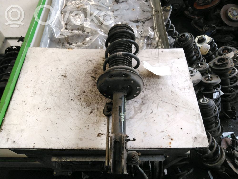 Opel Corsa D Amortiguador delantero 