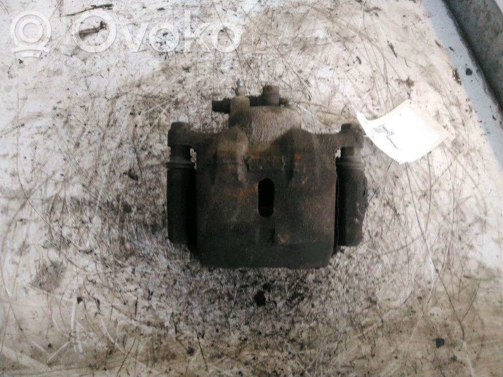 Toyota Yaris Zacisk hamulcowy przedni 