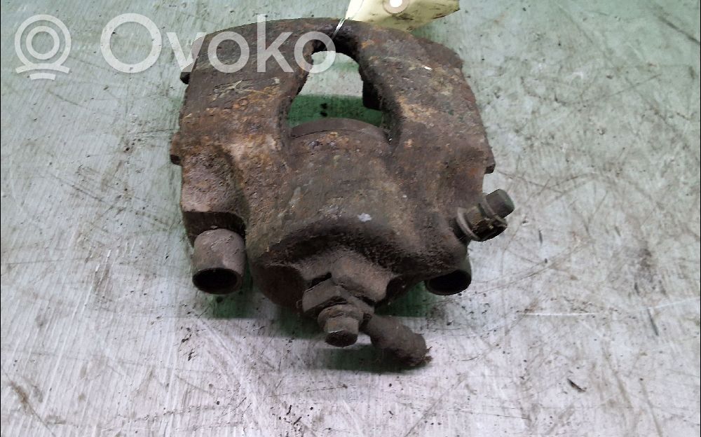Opel Astra G Zacisk hamulcowy przedni 