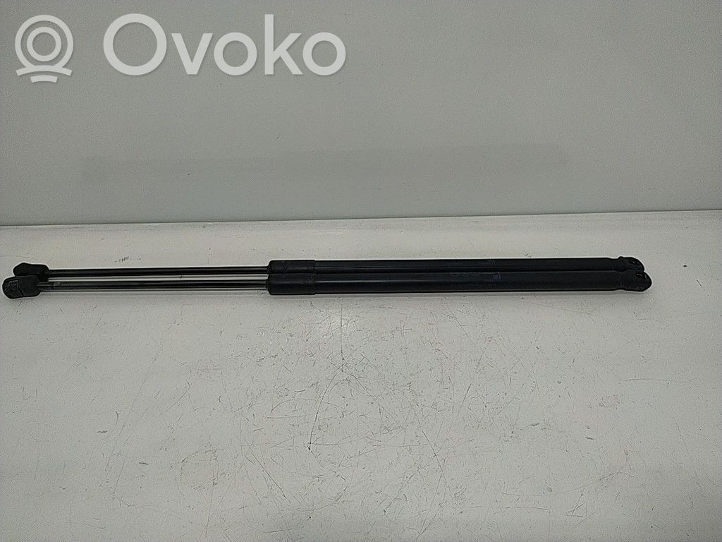 Opel Astra J Bagāžnieka amortizators 