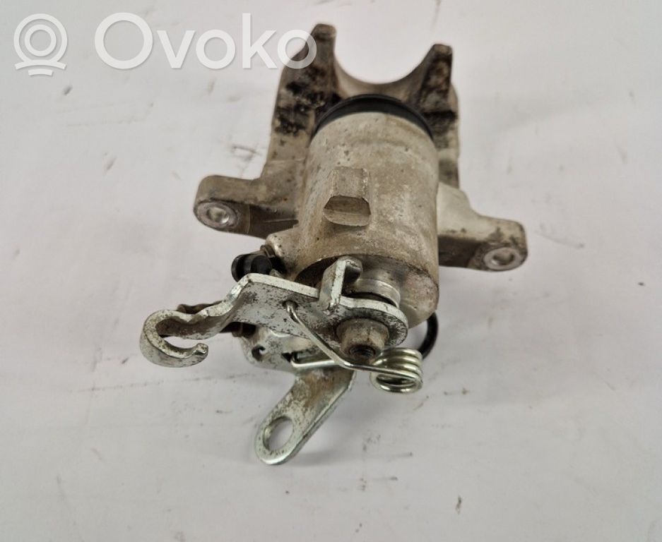 Volkswagen Jetta VI Tylny zacisk hamulcowy 