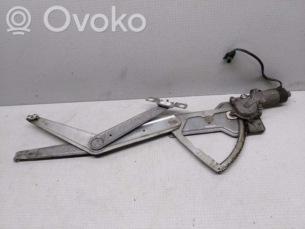 Opel Astra F Elektryczny podnośnik szyby drzwi 