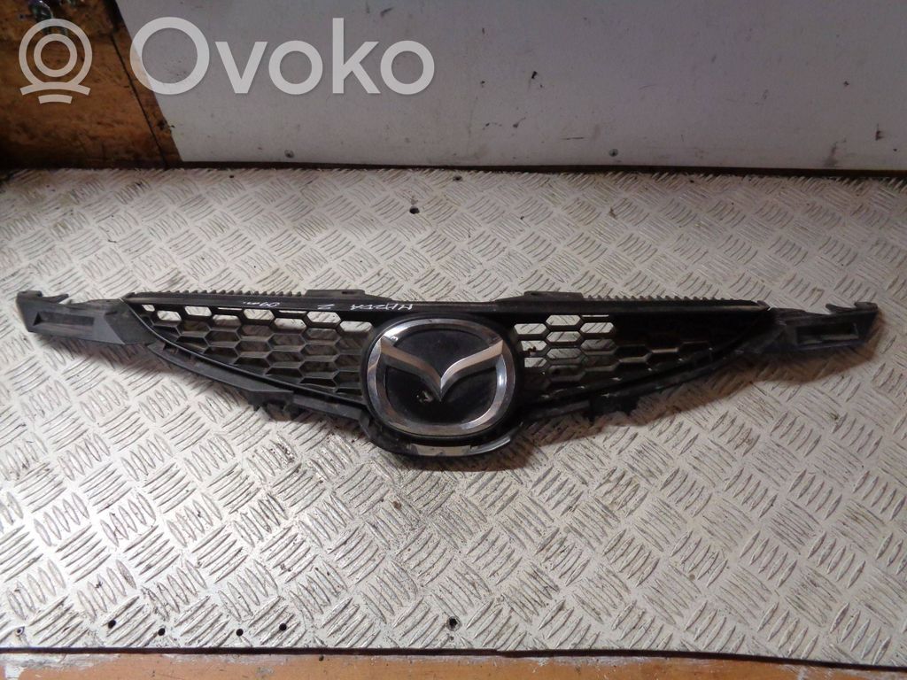 Mazda 2 Front bumper upper radiator grill 