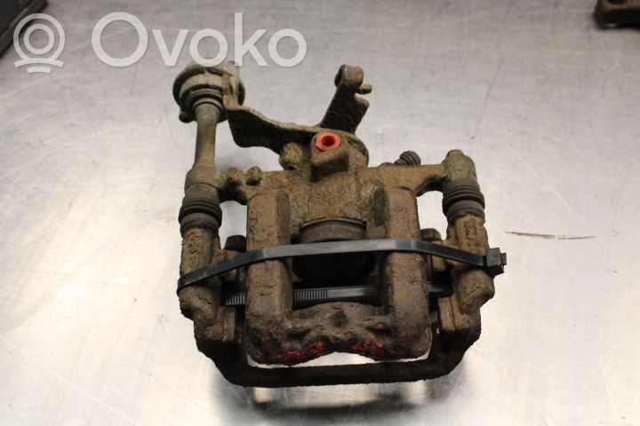 Opel Astra J Tylny zacisk hamulcowy 