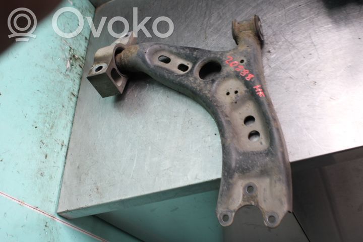 Volkswagen PASSAT B7 Braccio di controllo sospensione anteriore inferiore/braccio oscillante 