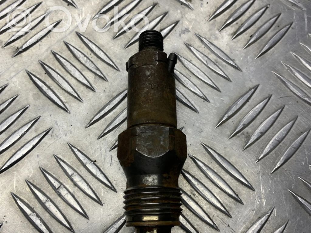 Inyector de combustible   6735401D