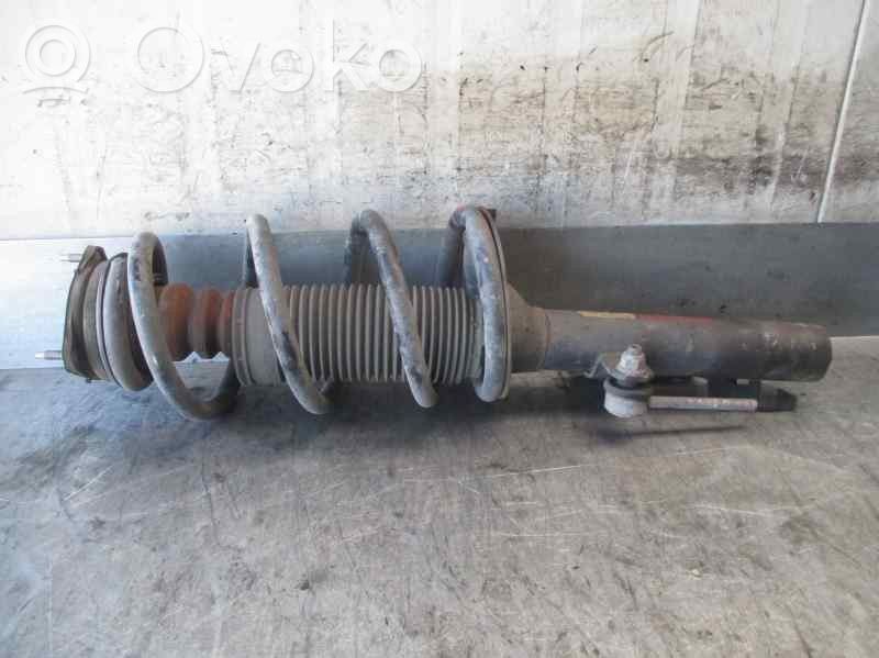 Nissan Primera Front shock absorber with coil spring 
