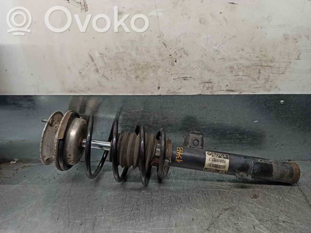 BMW 1 E81 E87 Etuiskunvaimennin kierrejousella 