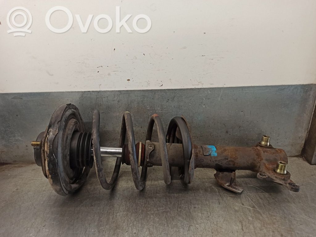 Nissan Primera Amortyzator osi przedniej ze sprężyną 