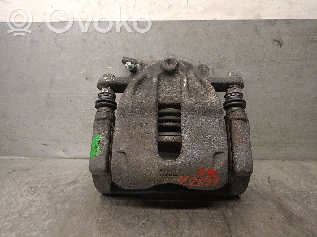Nissan Micra C+C Zacisk hamulcowy przedni 
