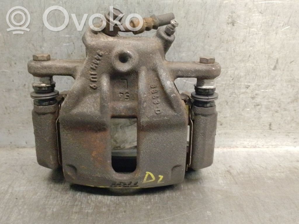 Nissan Note (E11) Zacisk hamulcowy przedni