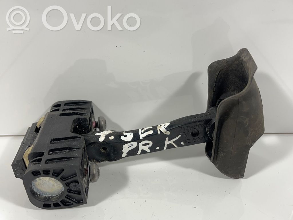 Front door check strap stopper   7176809,41517070333,4406424,51214406424,7070333