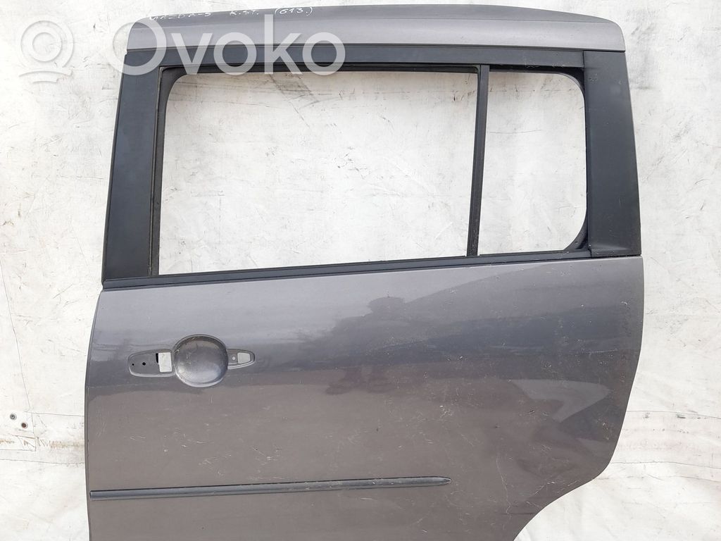 Mazda 5 Front door upper hinge 