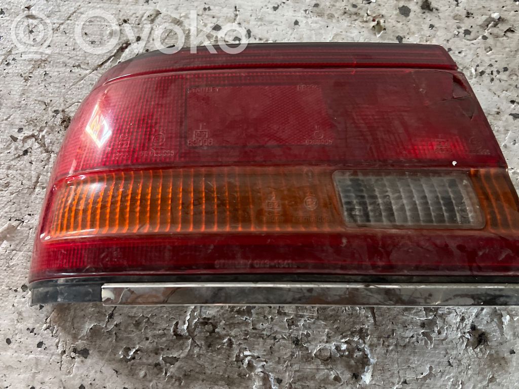 Mazda 626 Tail light bulb cover holder 