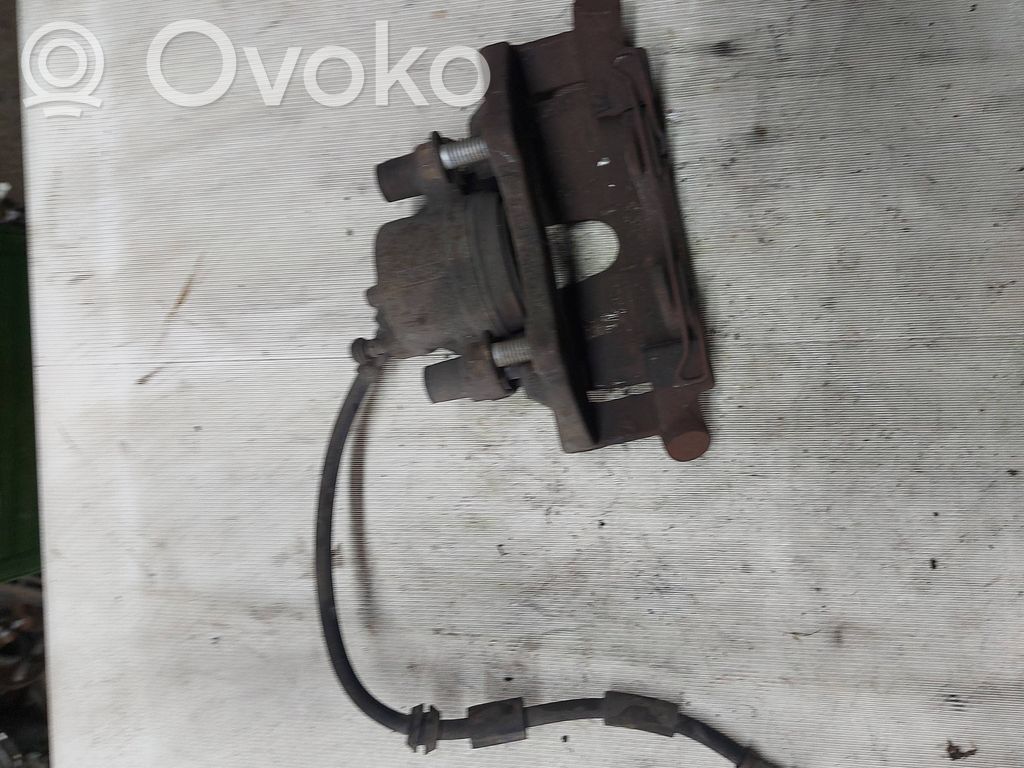 Ford Kuga I Front brake caliper 