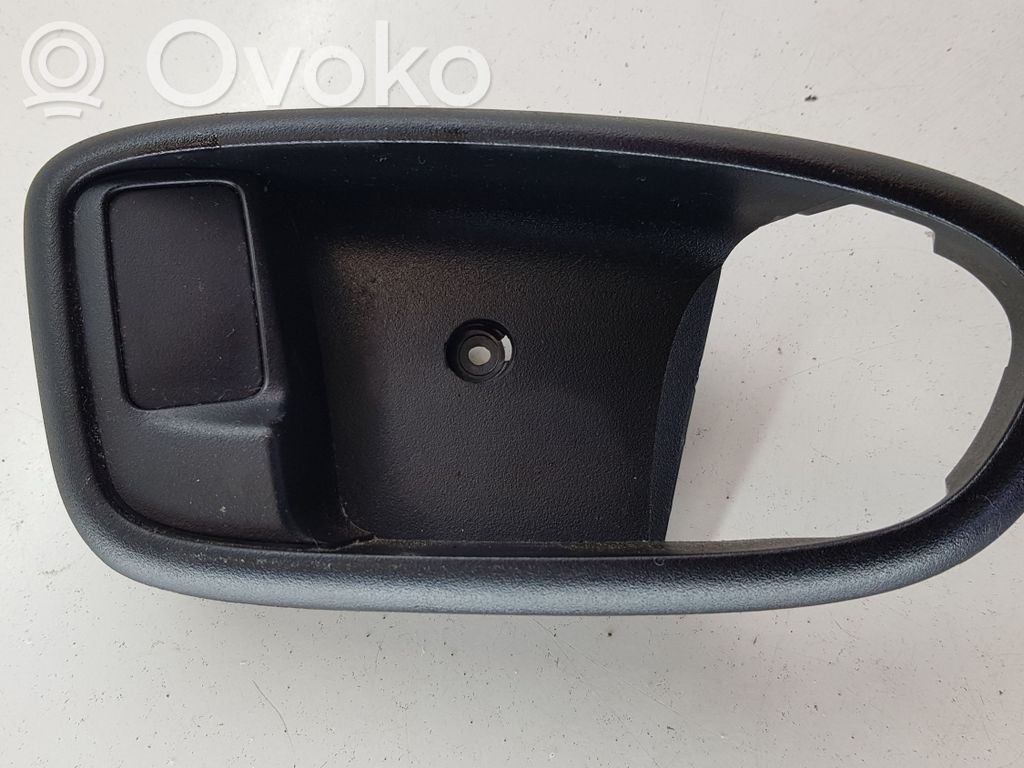 Front door interior handle trim