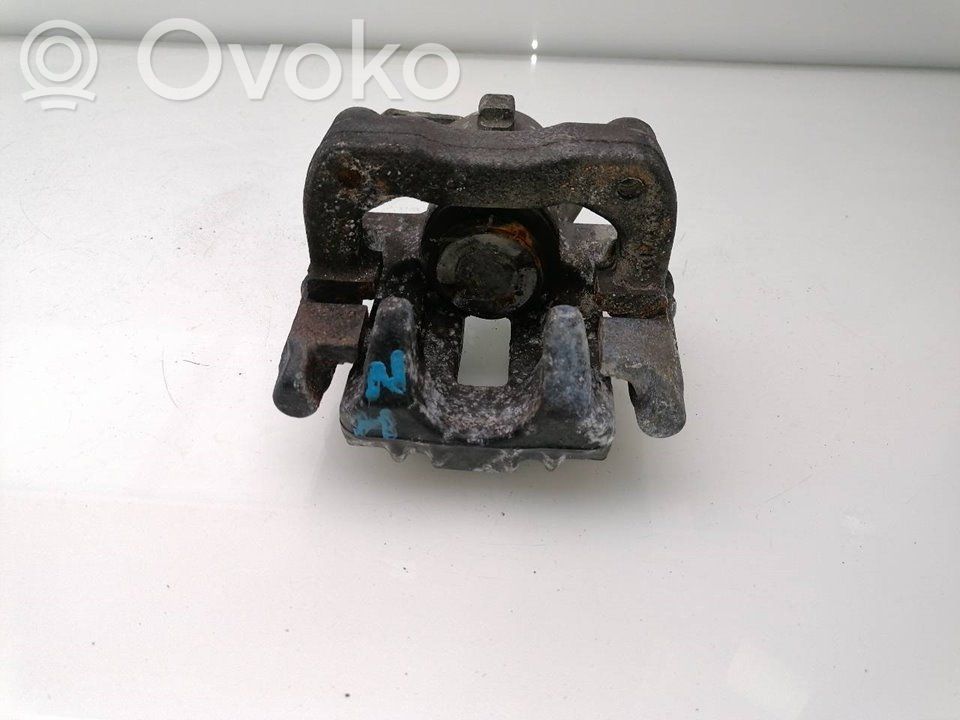 Задний суппорт   6R0615423