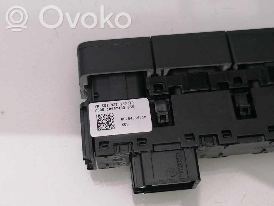 Volkswagen Golf VII Pulsanti/interruttori sul volante 