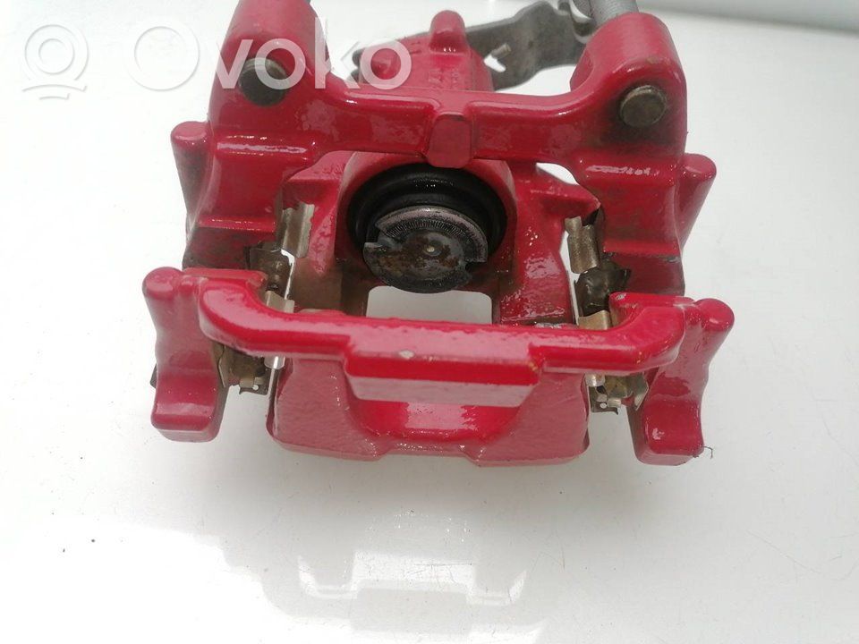 Caliper del freno trasero   1K0615424J