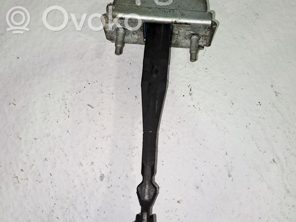 Opel Astra J Ogranicznik drzwi przednich 