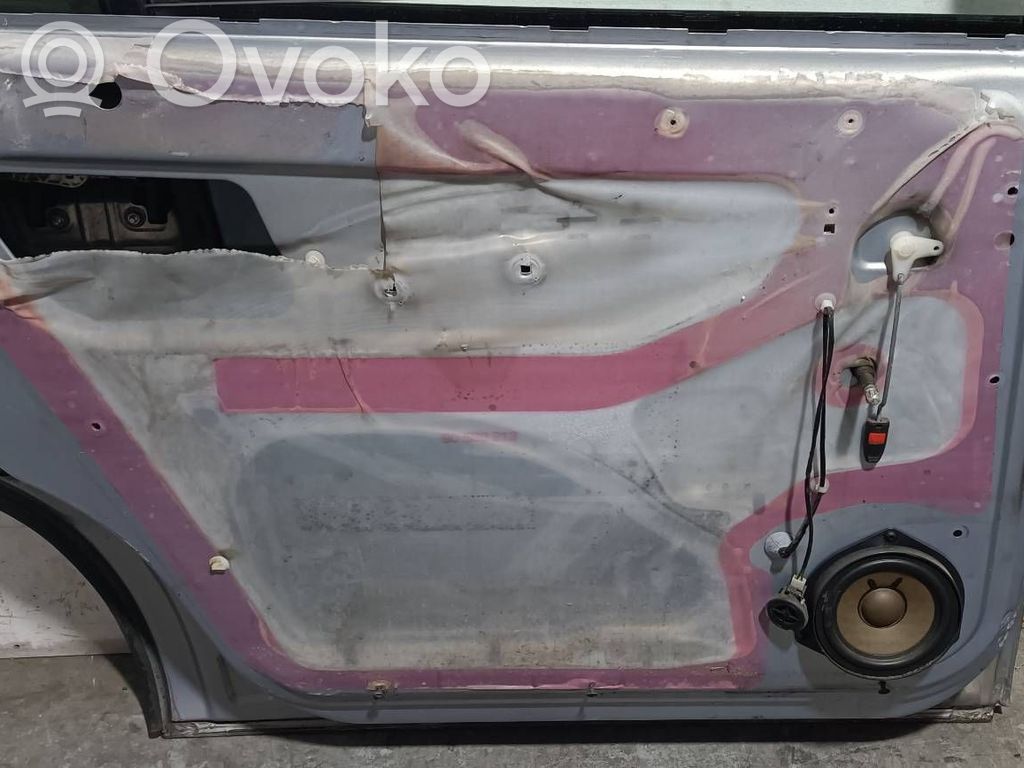 Regulador de ventanilla eléctrico de puerta delantera   90579503
