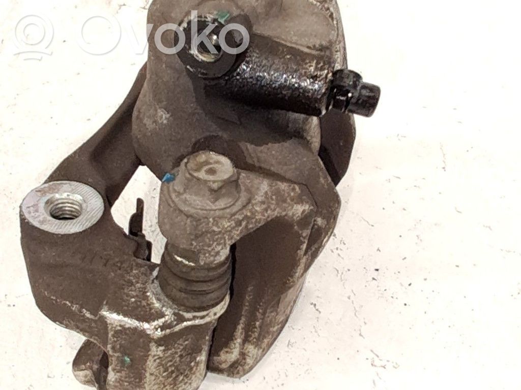 Chevrolet Aveo Zacisk hamulcowy przedni 