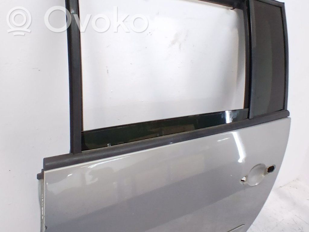 Puerta trasera   7751476284