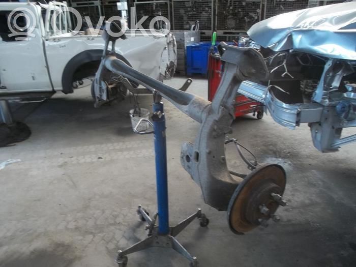Opel Astra J Eje trasero 
