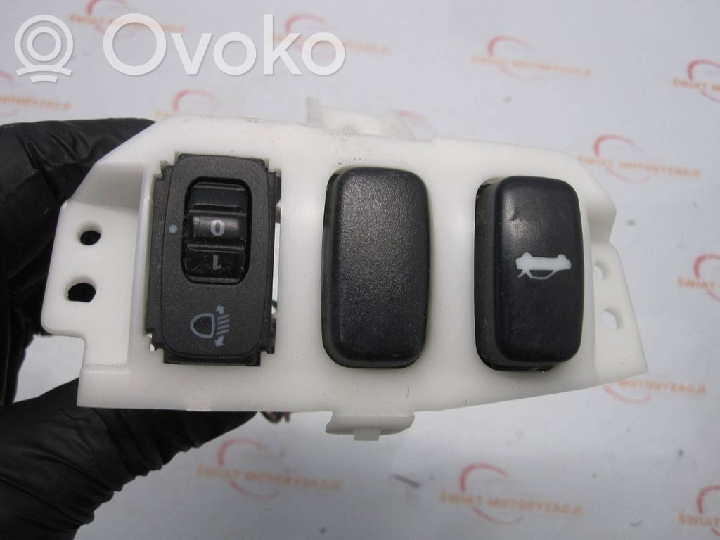 Headlight level height control switch