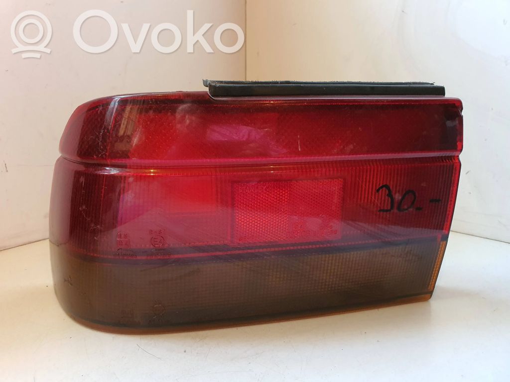 Mitsubishi Lancer Portalampada fanale posteriore 