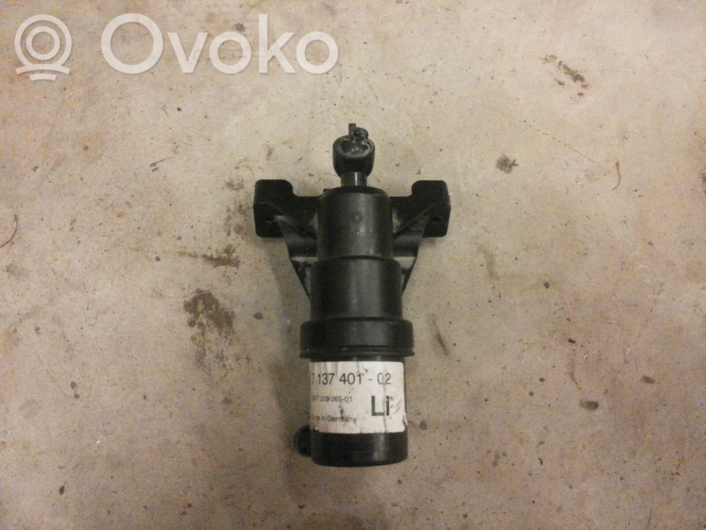 Headlight washer spray nozzle   7137401