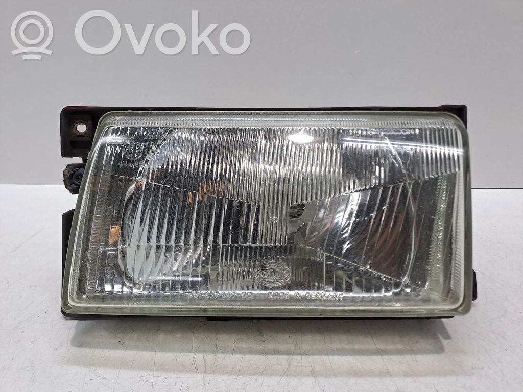 Volkswagen Polo II 86C 2F Lampa przednia 