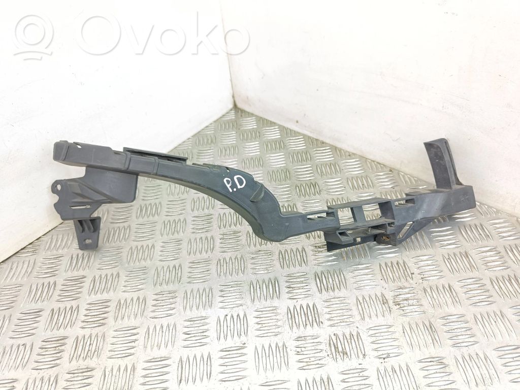 Opel Zafira C Uchwyt / Mocowanie lampy przedniej 