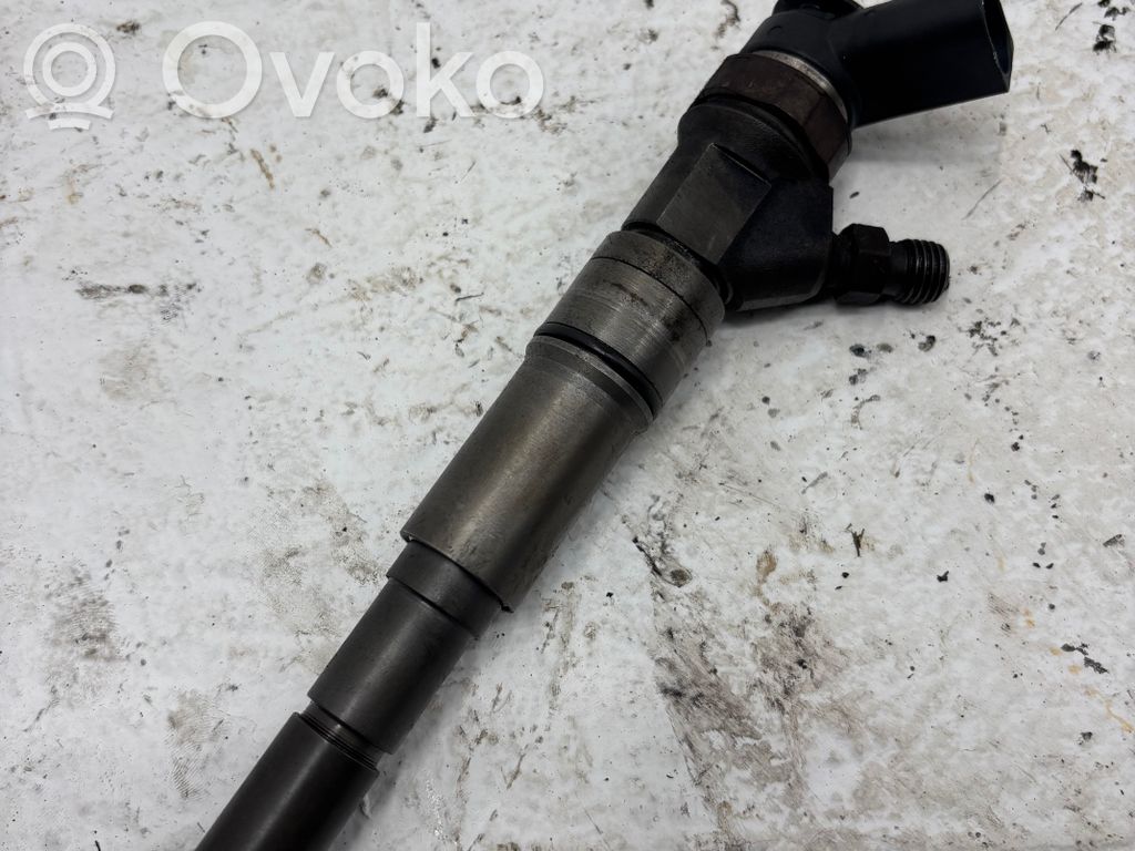 Fuel injector   7788812