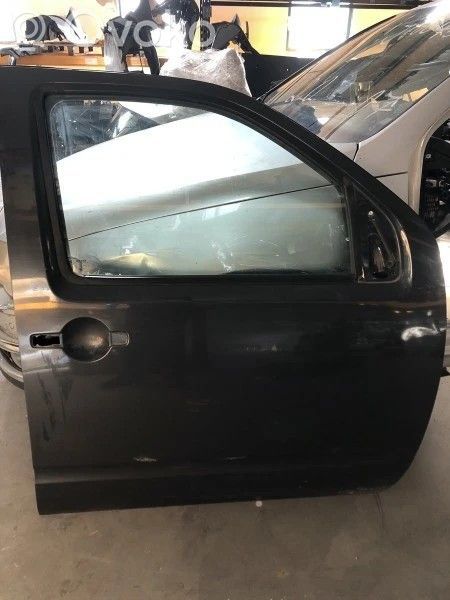 Nissan Navara D40 Puerta delantera 