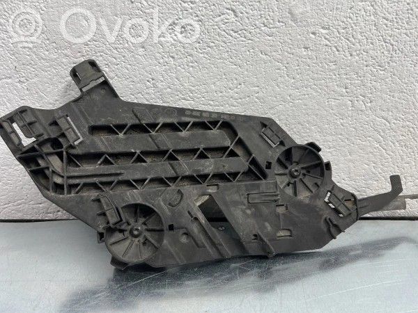 Ford Fiesta Uchwyt / Mocowanie lampy przedniej 
