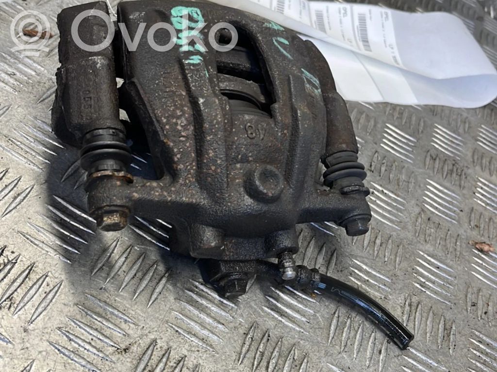 Opel Corsa C Zacisk hamulcowy przedni 
